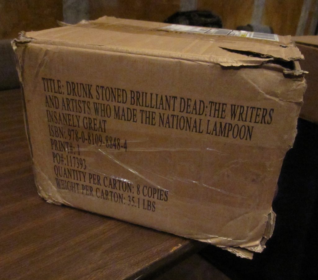 Photo of a box containing copies of Rick Meyerowitz's book Drunk Stoned Brilliant Dead.